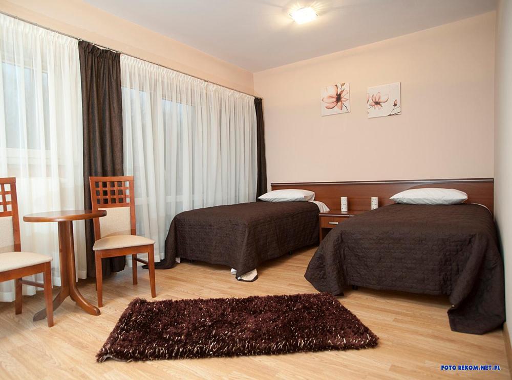 Hotel Trzy Korony à Głogów Małopolski Chambre photo